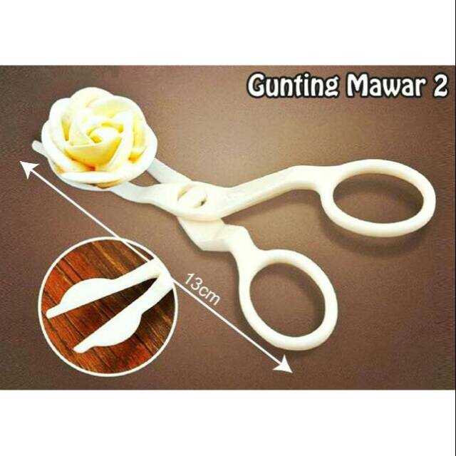 

Gunting Mawar 2