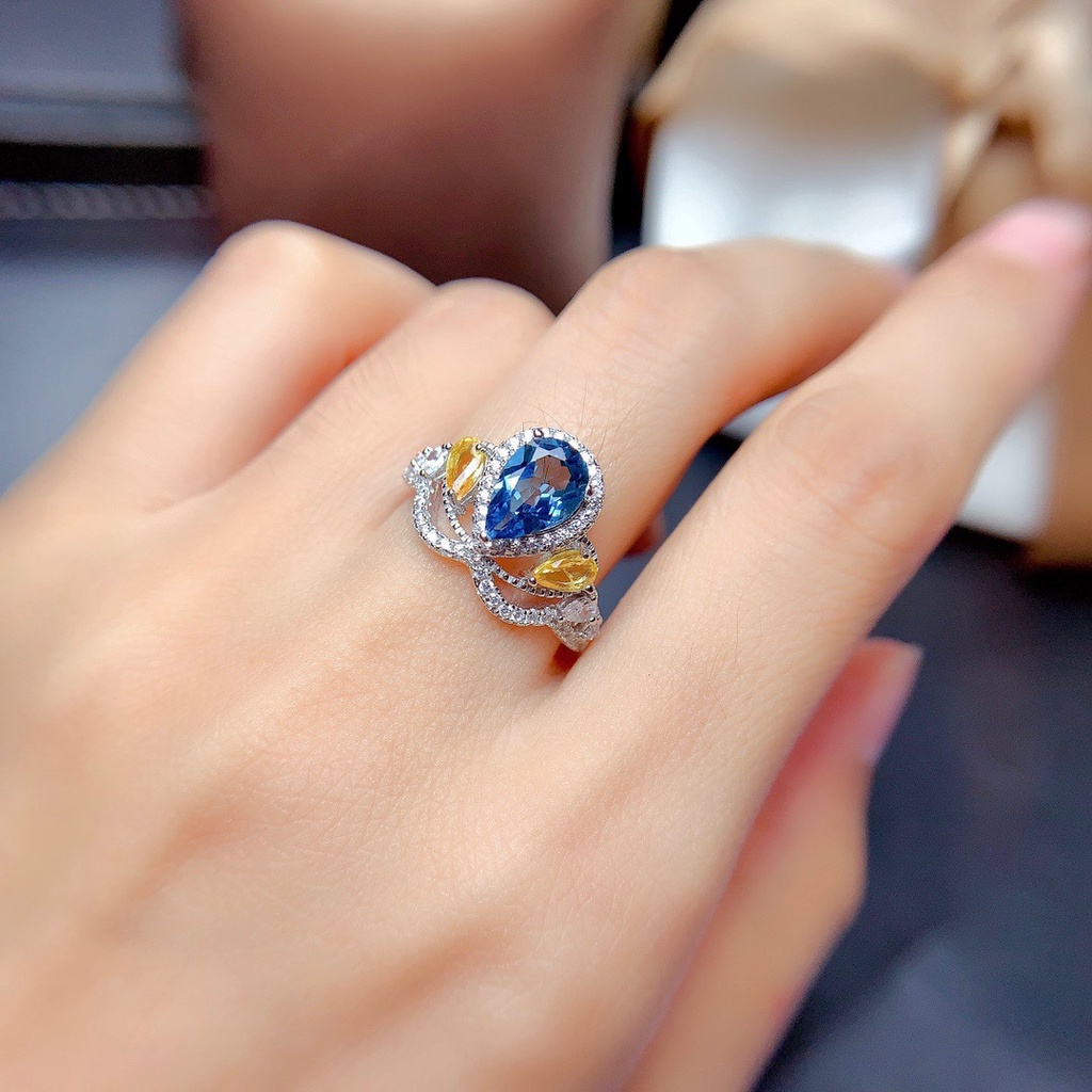 Cincin Model Terbuka Desain Mahkota Hias Topaz Biru Gaya Simple Untuk Wanita