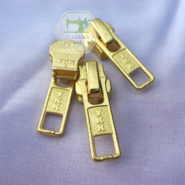 Kepala Resleting YKK