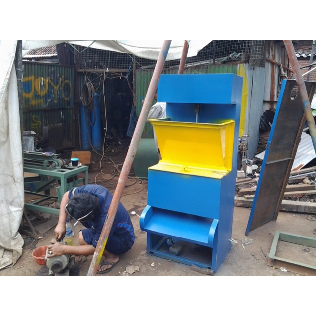 Mesin pengupas kulit kemiri