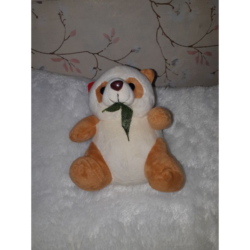 Bless panda daun dari mesin capit timezone