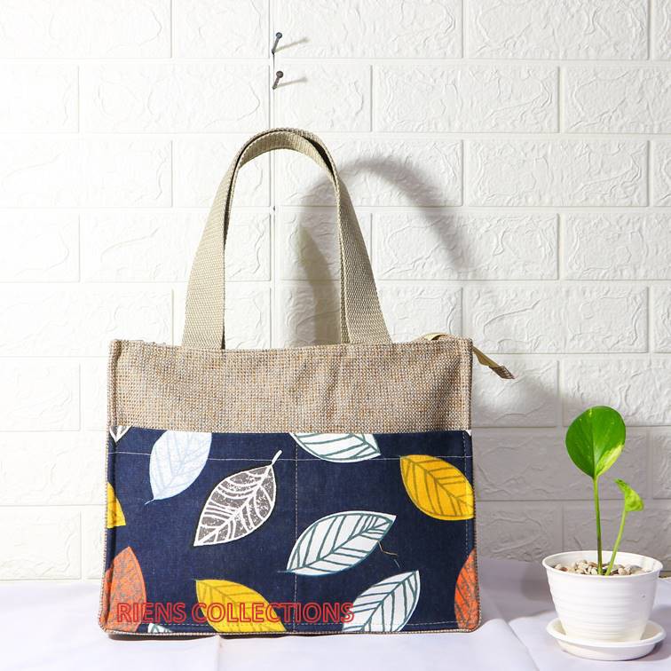 RIENS COLLECTIONS. TAS GONI KOMBINASI KANVAS MOTIF DAUN NANGKA BIRU