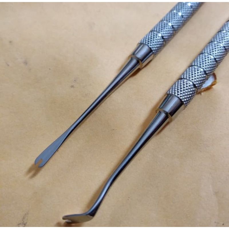 ligature director / ligature tucker / lidah ular