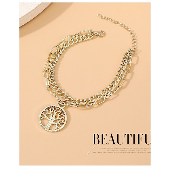 LRC Gelang Tangan Fashion Golden Round Life Tree Hollow Alloy Y64448