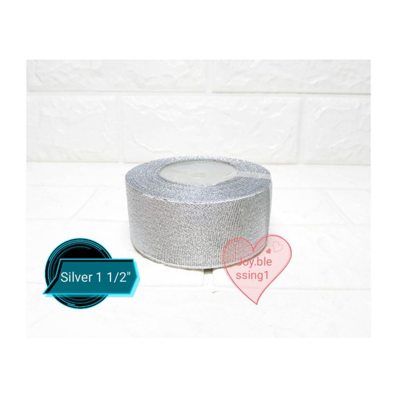 

PITA PERAK SILVER GLITTER 1 1/2" (4 CM) ECER PER ROLL