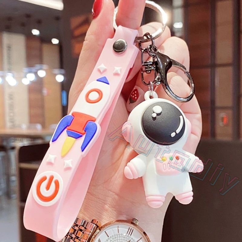 Kartun Luar Angkasa Astronot Roket Planet Gantungan Kunci Lucu 3D Spaceman Figure Lanyard Cosmonaut Keyrings Silicone Trinket Props Bag Doll Key