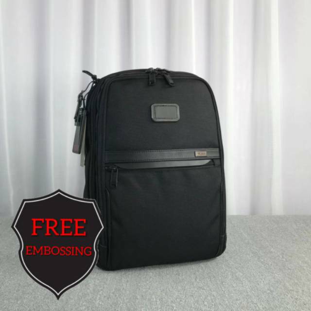 tumi slim backpack