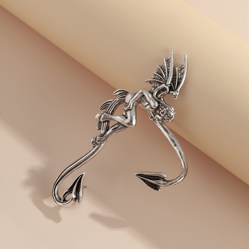 Fancyqube 1pc Anting Klip Telinga Tanpa Tindik Warna Silver Gaya Punk Untuk Wanita