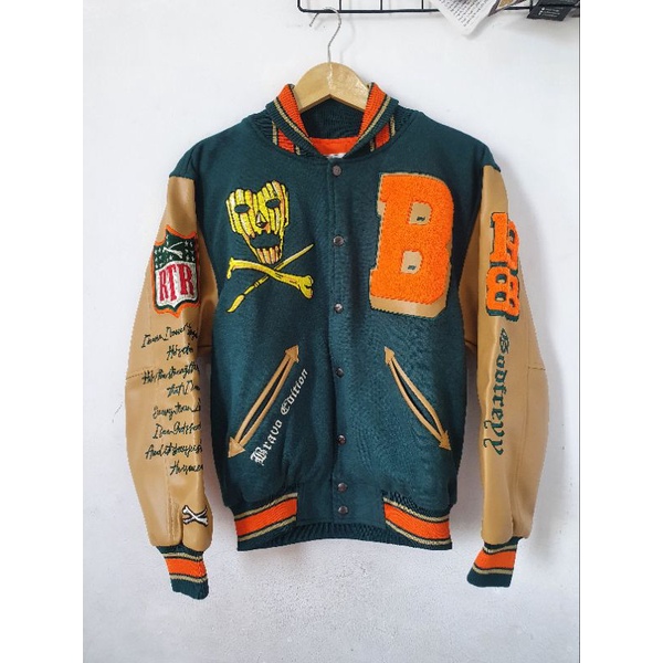 VARSITY CHAMP JACKET RAW TYPE RIOT X BRYANT BRAVO LIMITED EDITION RARE ITEM. JAKET RAWTYPE RTR AUTHE