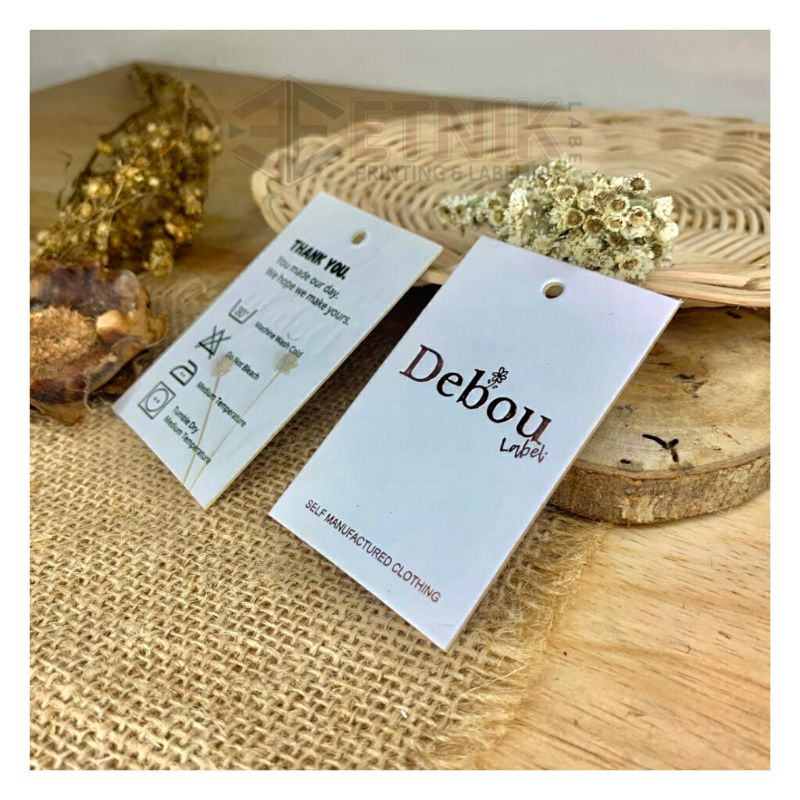 

LABEL HANGTAG TEBAL LAMINASI DOFF/Label Hangtag murah laminasi doff ukuran bisa custom