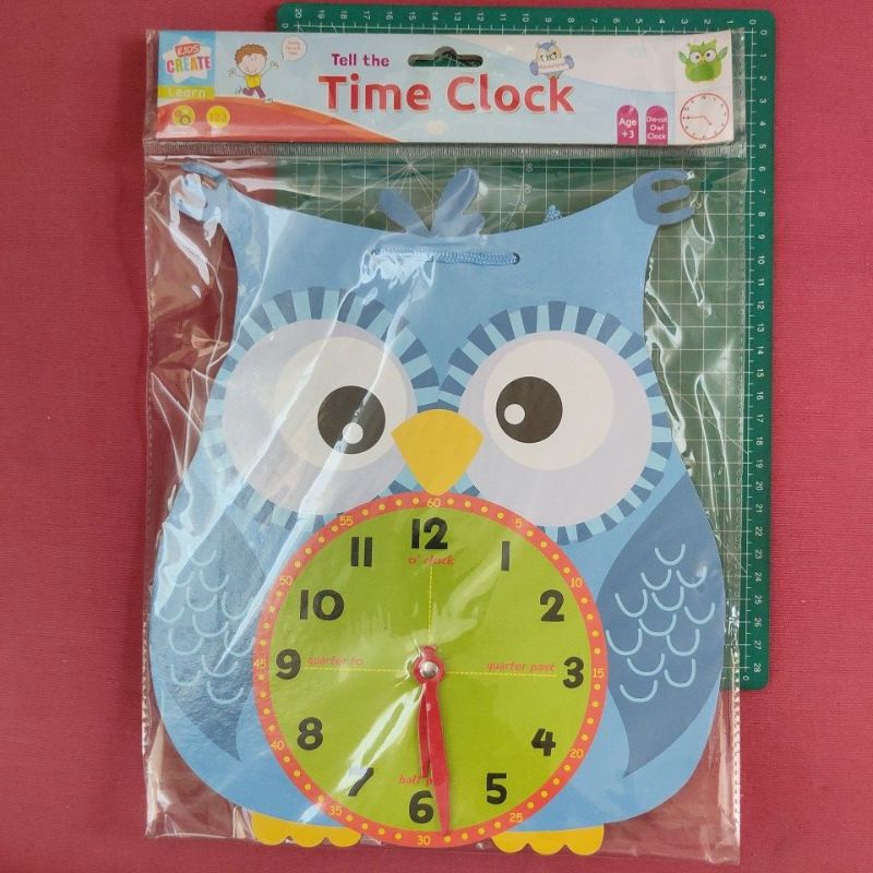 Owl clock. Tell the time clock