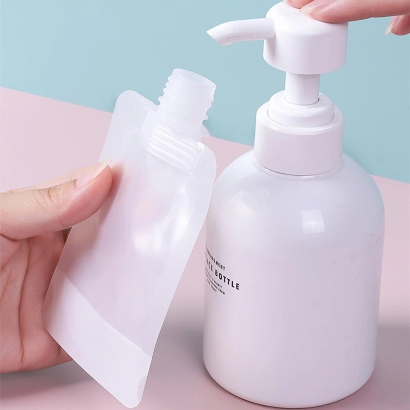 5 Pcs Tas Penyimpanan Kosmetik Lotion Portabel Model Flip top Dapat Diisi Ulang Tahan Bocor 30 / 50 / 100ml