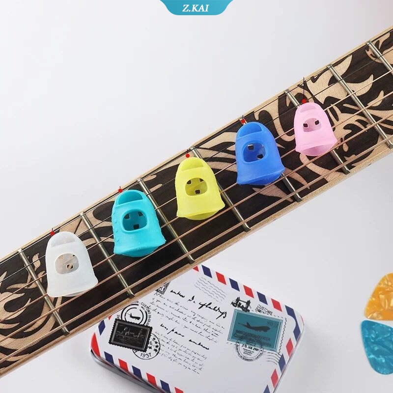 5 / 10pcs / Set Cover Pelindung Ujung Jari Bahan Silikon Warna-Warni Untuk Gitar Ukulele