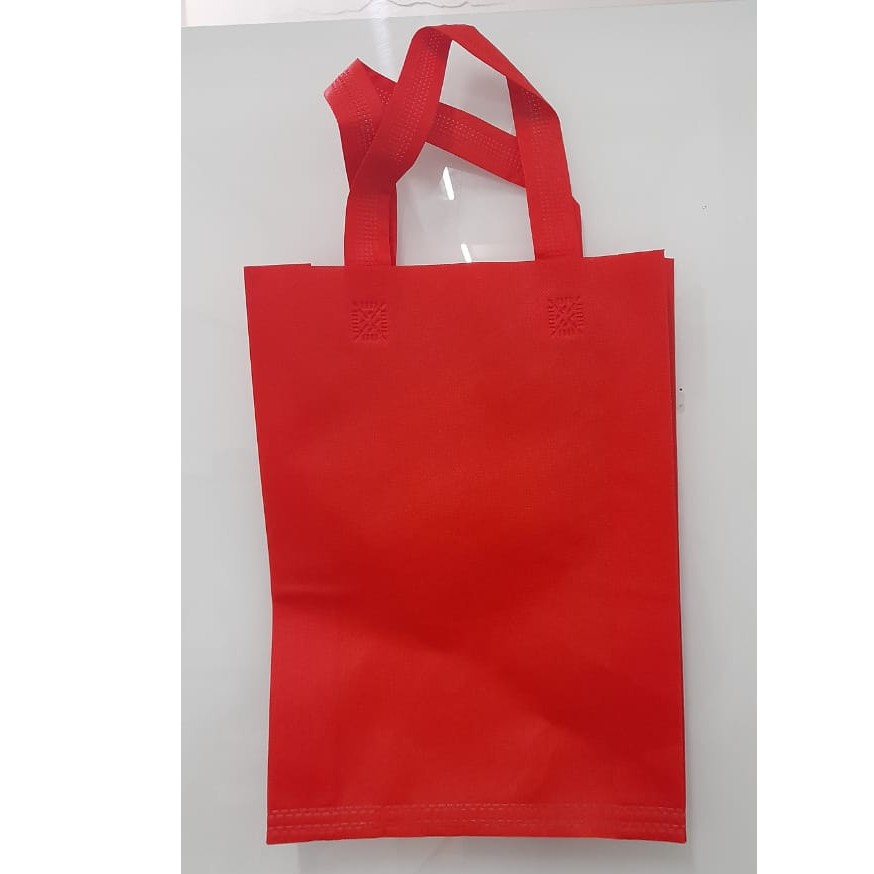 

Tas Press Spunbound Tali Goodie Bag Tas Belanja Warna Merah 30 cm x 40 cm
