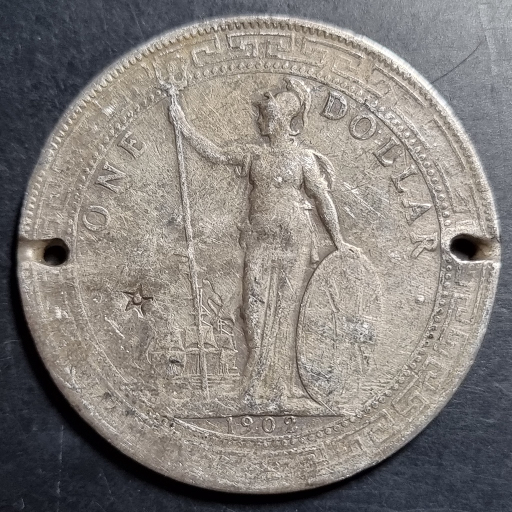 Koin perak British Trade Dollar 1902 B bekas Peninggalan Suku Dayak