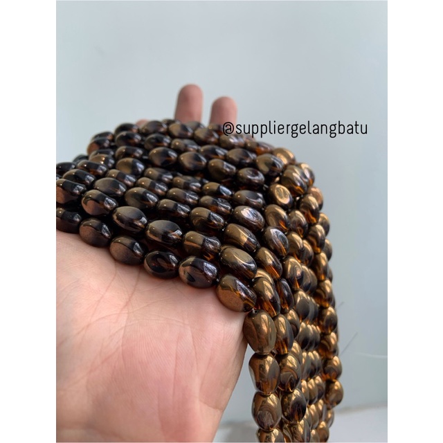 kristal CEKO KACANG GOLD brown quartz 10mm cokelat emas oval cutting