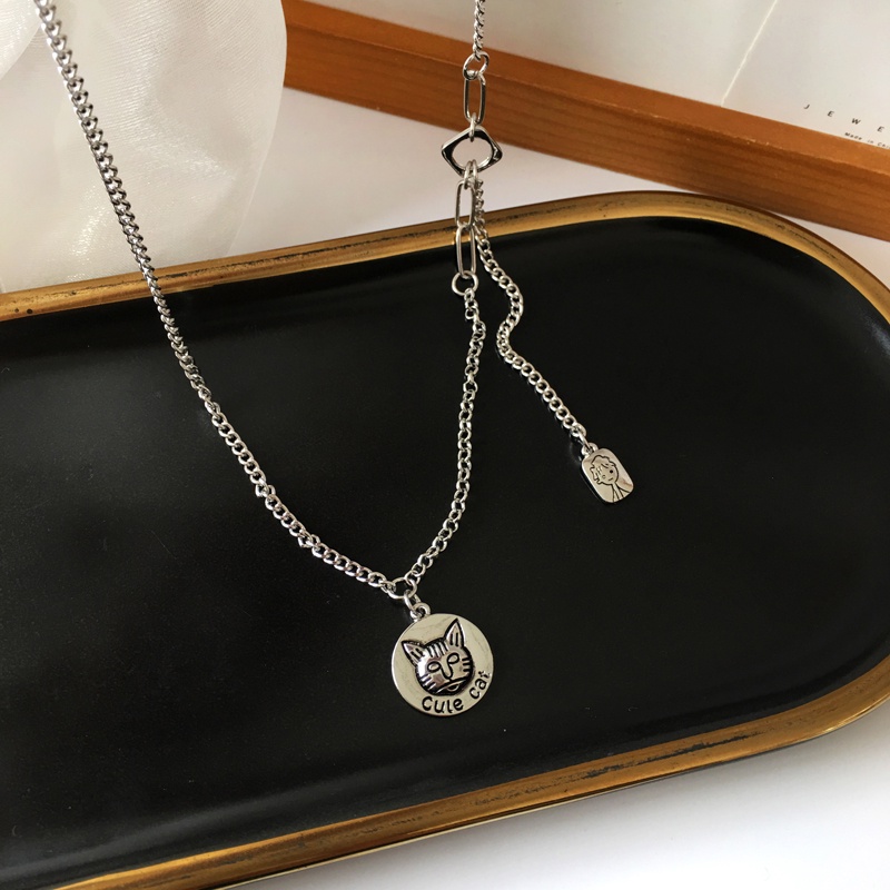 Korean Hip Hop Cat little girl pendant Version Retro Style Personality Fashion Punk Necklace Niche Design Clavicle Chain Sweater Necklace for women