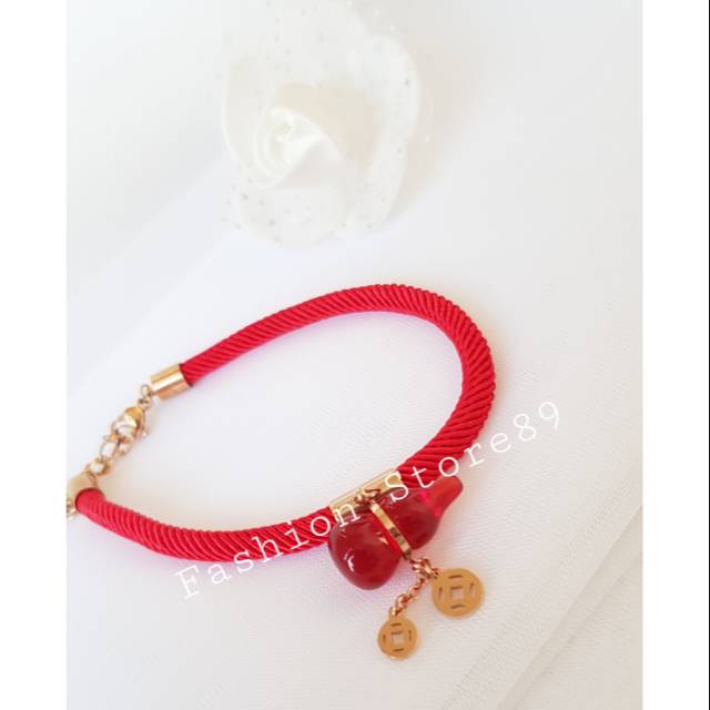 Gelang bestseller import new arrival limited Edition fashion tali merah botol import titanium