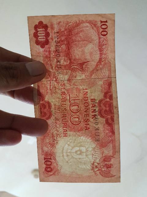 UP119 UANG KUNO 100 RUPIAH BADAK TH 1977/UANGLAMA/UANGKOLEKSI/MAHARNIKAH