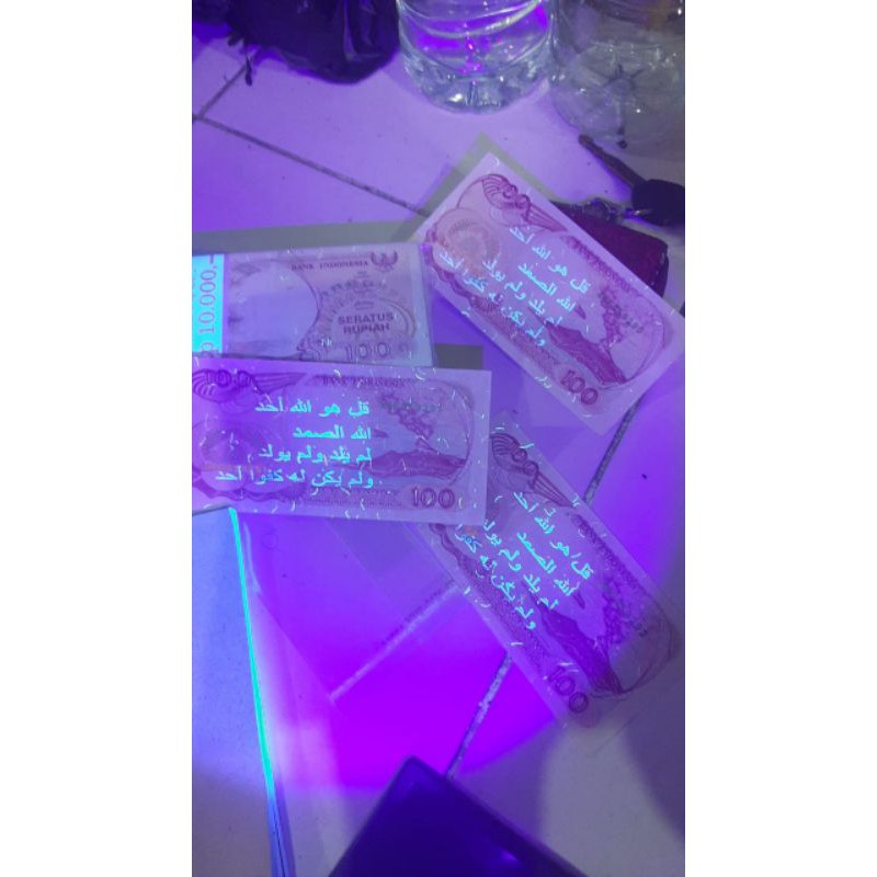 uang 100 perak kertas