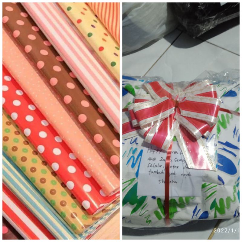 

Tambah kertas kado sebagai pembungkus paket