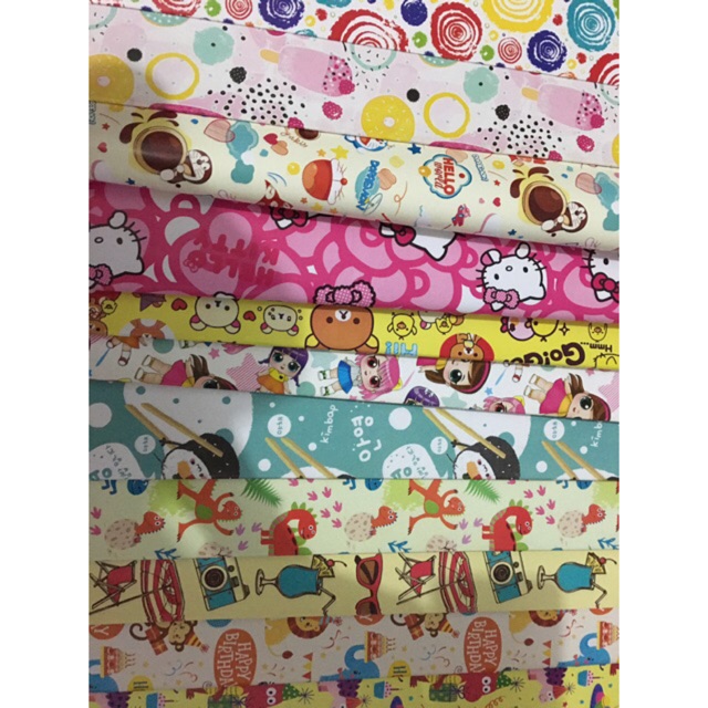 

kertas kado motif cewek/cowok