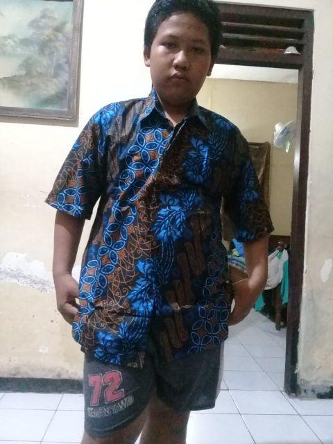 Kemeja Batik Pria Motif Asmat