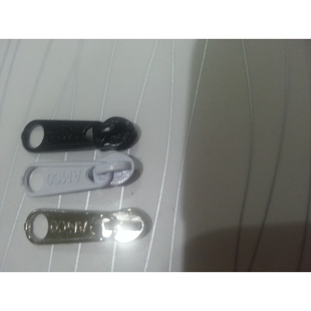 100 Pcs Kepala resleting slider besi ukuran no.3 untuk coil. Amco high quality