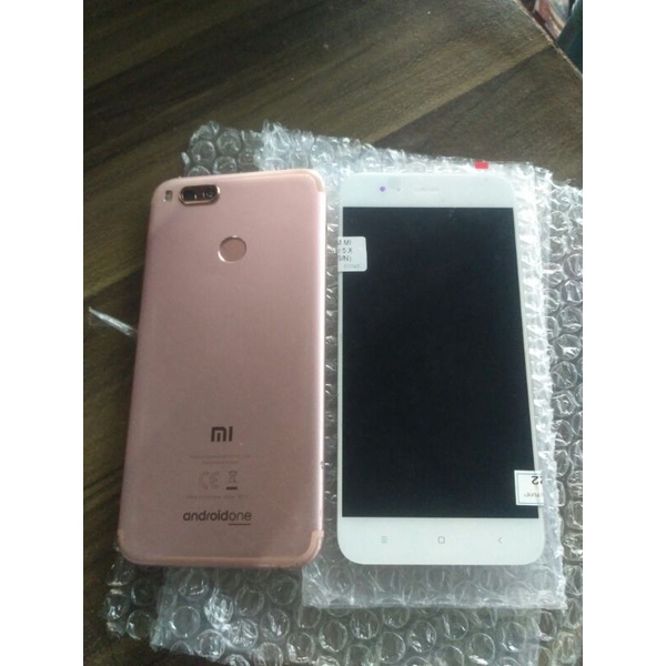 XIAOMI MI A1 4/64, LCD New Tested On, Mesin Mati Total,Casing Lecet Pemakaian,Buzzer,FingerPrint On.