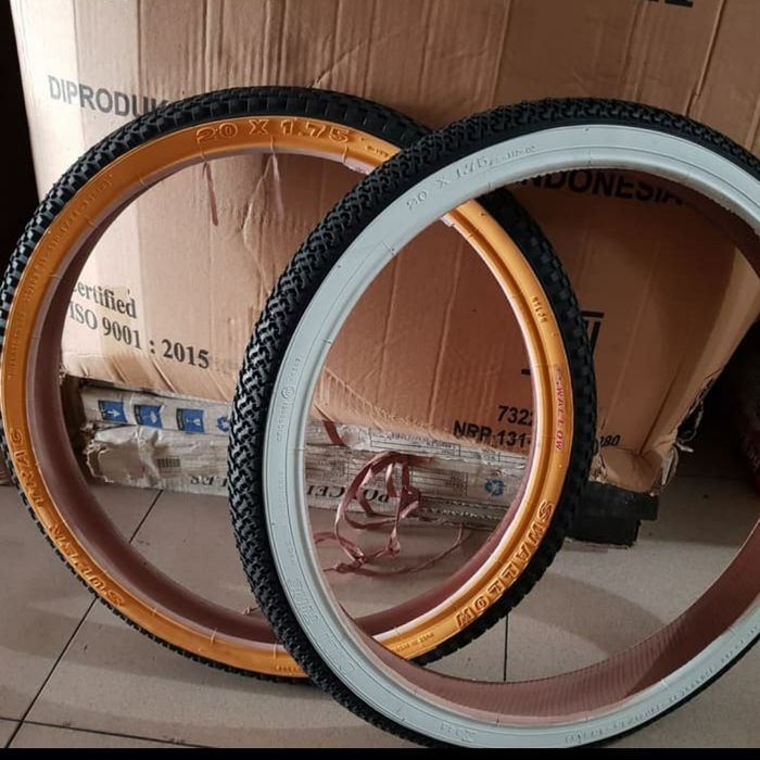 Ban Luar Sepeda Swallow 20 x 1.75 Deli tire - list putih /kuning