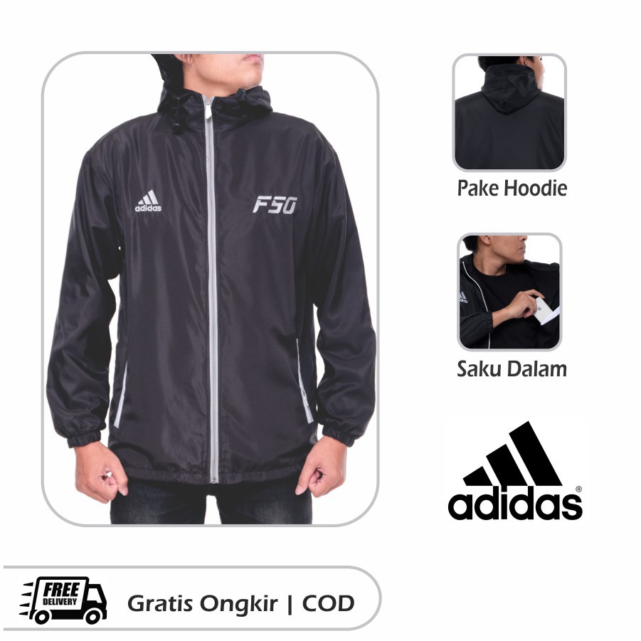 Jaket Running / Jaket Parasut Sport Tracker F50 Hitam Strip Putih