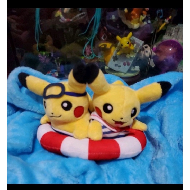 boneka pikachu renang