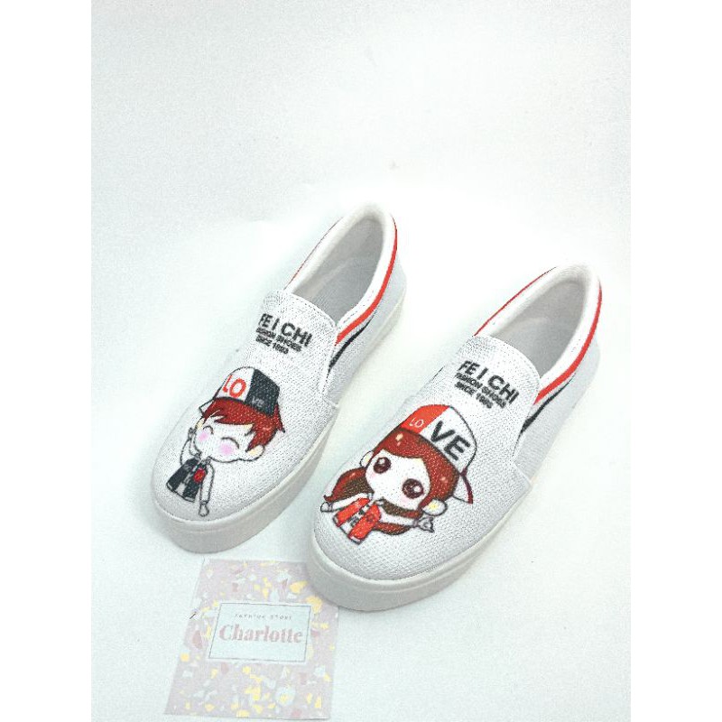 SEPATU WANITA SLIP ON KARAKTER LOVE BOY BEST SELLER MURAH WARNA HITAM DAN PUTIH UKURAN 36-40