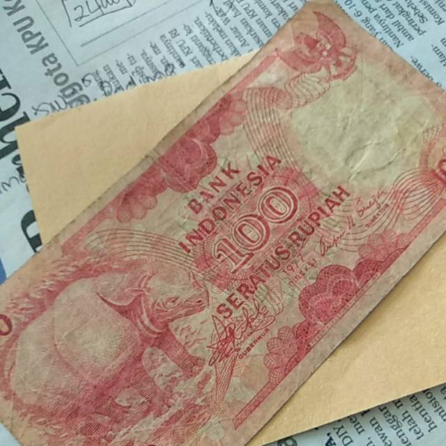 uang kertas 100 kuno tahun 1977 gambar badak