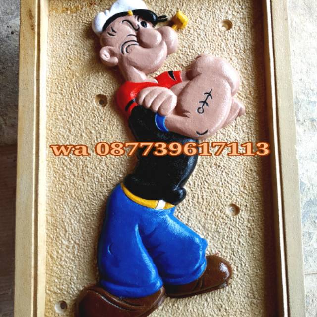 ukiran popeye batu alam hiasan dinding relief ornamen loster