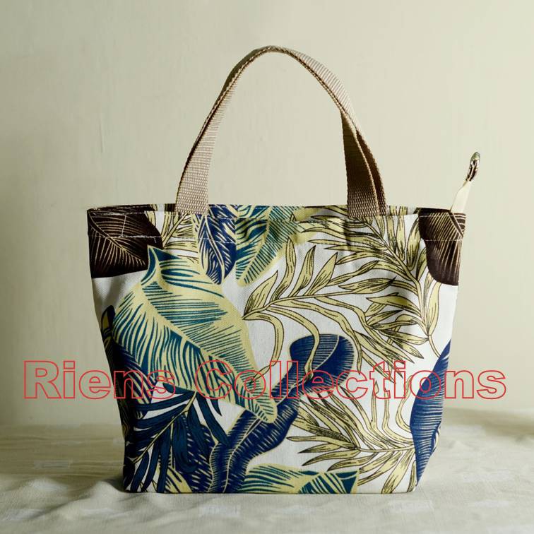 RIENS COLLECTIONS. HANDBAG BESAR BAHAN KANVAS MOTIF TROPIKAL