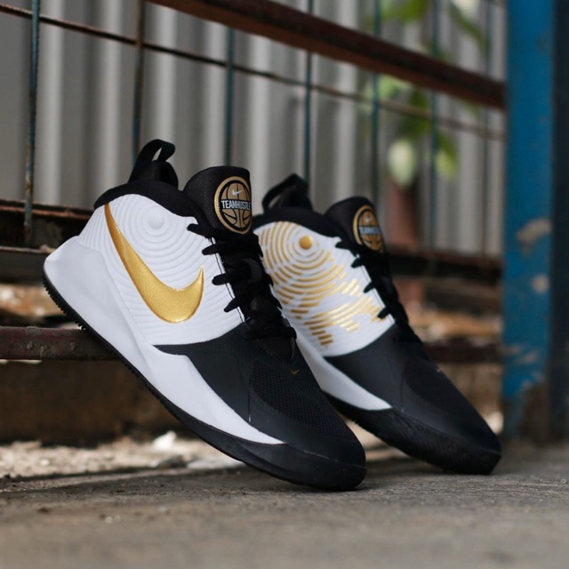 nike team hustle d9 gold