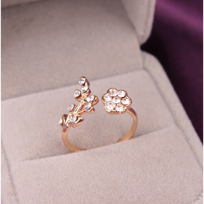 Cincin Korea fashion temperamen berlian memutar daun angan ring pembukaan bunga