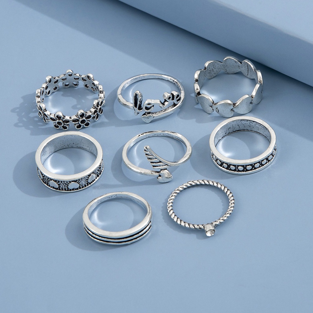 Pribadi ornamen dan bentuk sayap sedikit Daisy Bahasa Inggris love trendy cincin 8-piece set