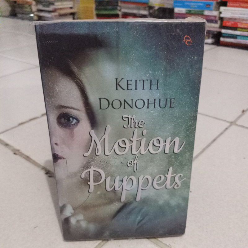 

The Motion of Puppets_Novel Horror.buku ori