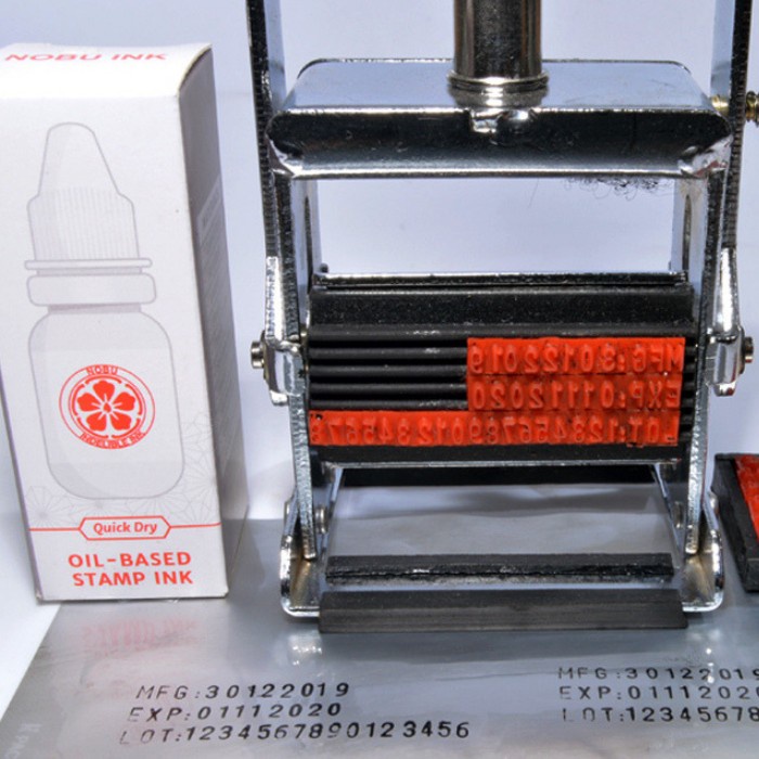 

Menyurat-Surat- Mesin Coding Expired Date - Stempel Manual | Nichia Stamper - 2X3 Mm -Surat-
