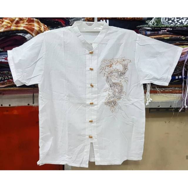 Hem import kain katun canvas  bordir naga.