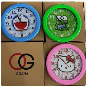 Jam Dinding Ogana Tembok karakter Doraemon ,helloKitty keroppi