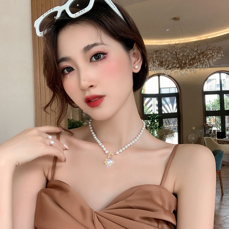 Korea Fashion Wanita Cahaya Mewah Elegan Retro Mutiara Cinta Liontin Kalung