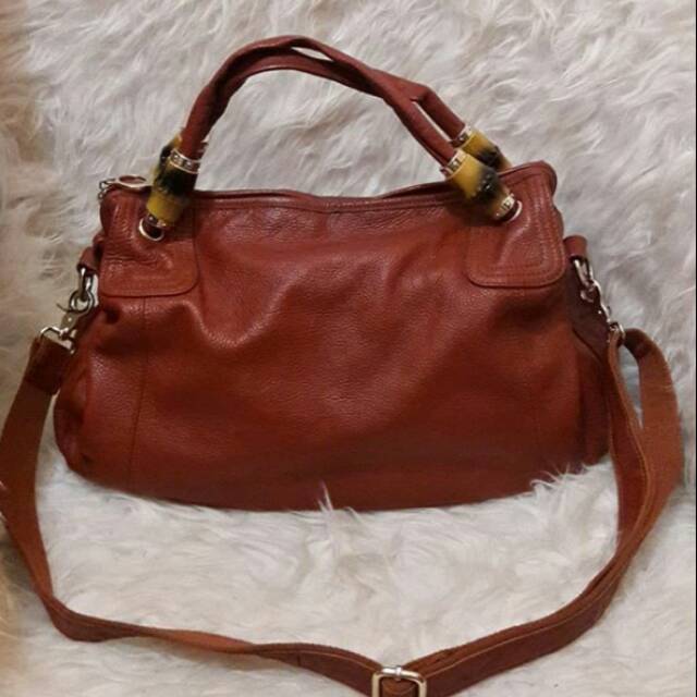 jon louis sling bag