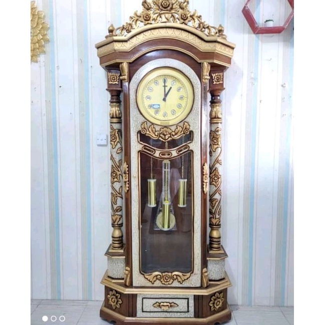 almari jam gadang ukir kayu jati modern furniture mebel jepara