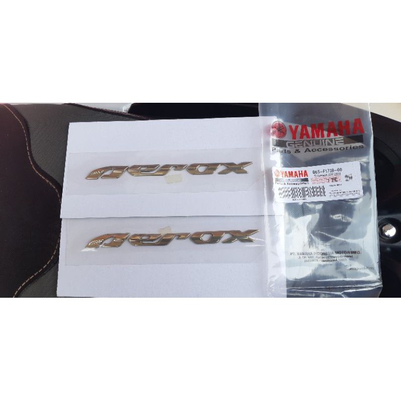 emblem aerox gold original sepasang