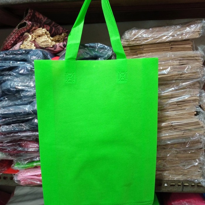 

Ginger- Tas spunbond handle uk 30x40x8/Goodie bag/tas kain polos