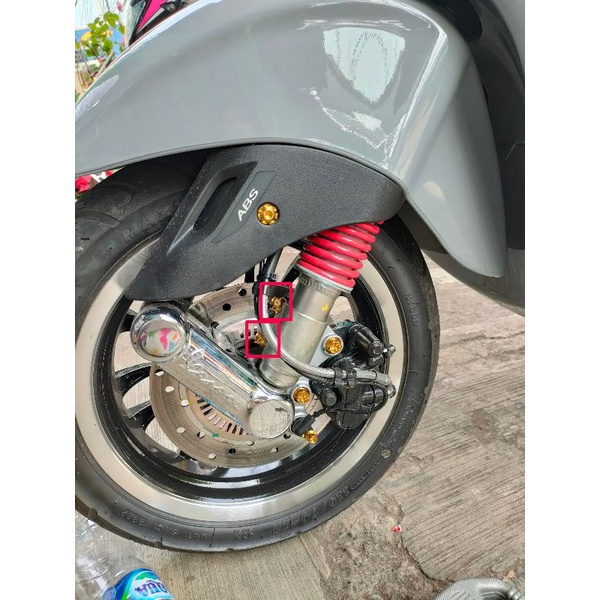 NACOM DV BAUT JEPITAN SHOCK DEPAN VESPA MATIC