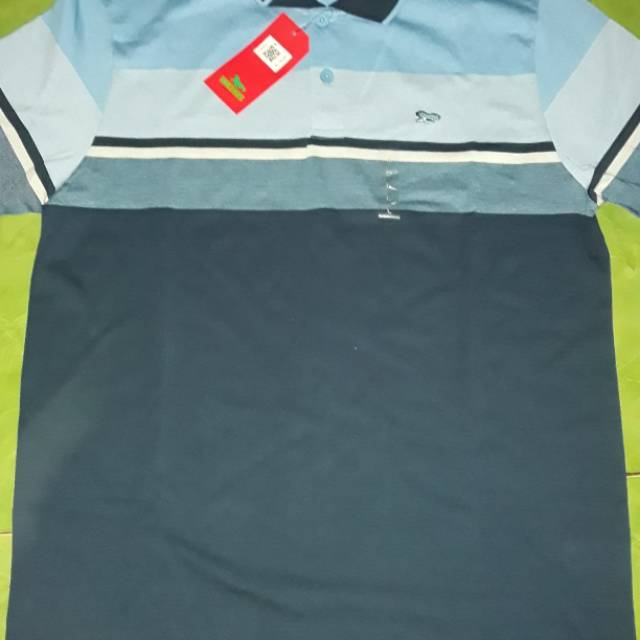 kaos polo walrus size M